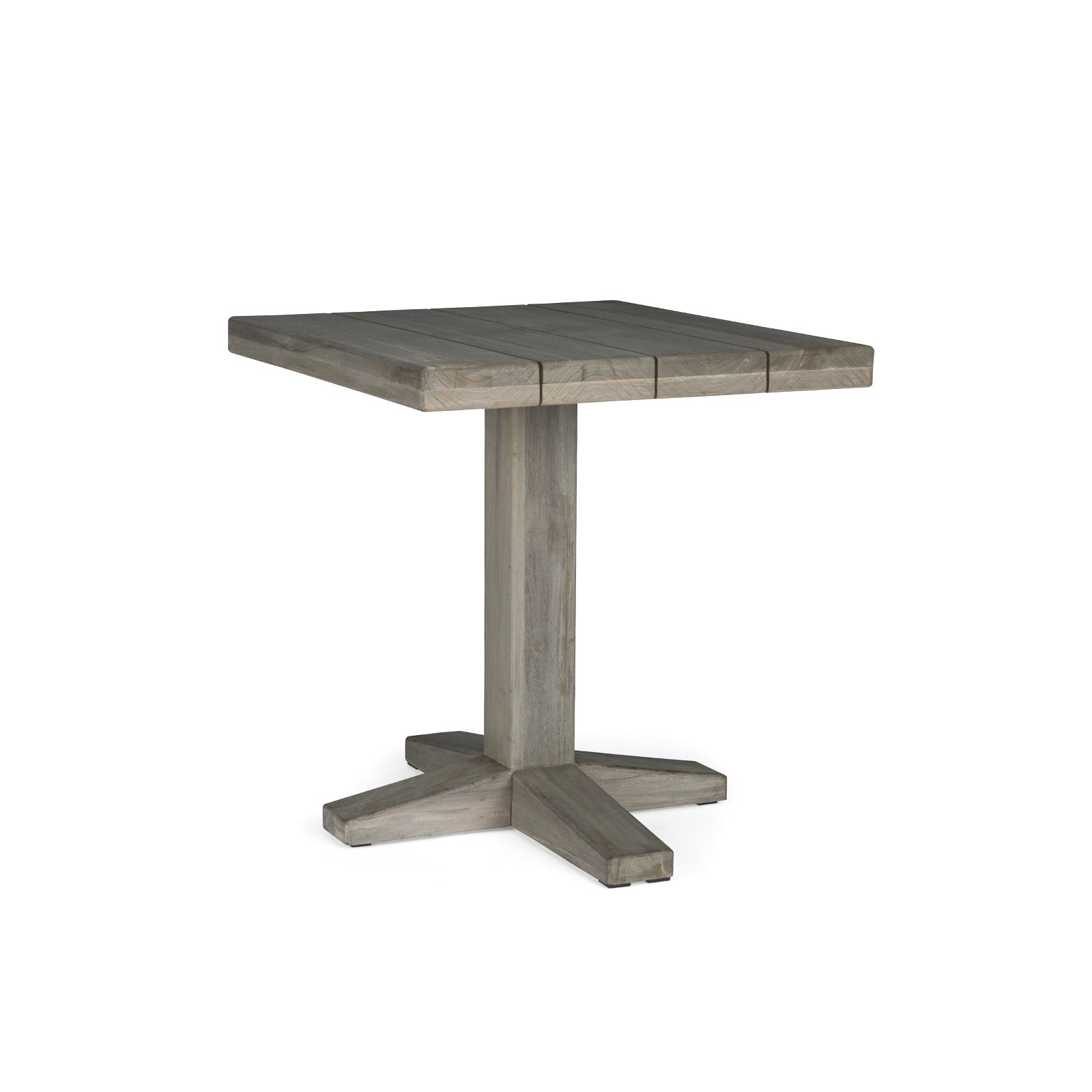 A square wooden table stands on a central pedestal base with a four-pronged support, designed for minimalist or rustic interiors. The background is plain white.