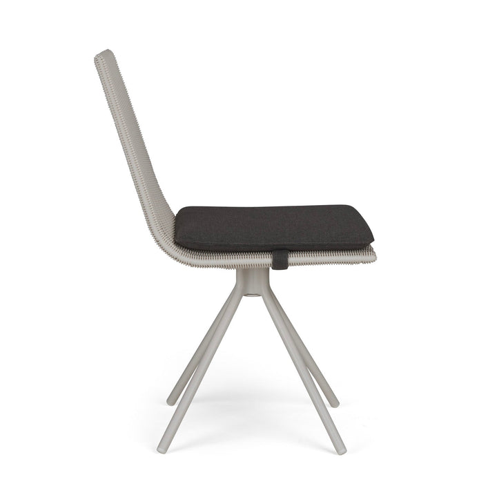 A sleek, modern chair with a dark cushioned seat, angled metal legs, and a textured fabric backrest, positioned against a plain white background.