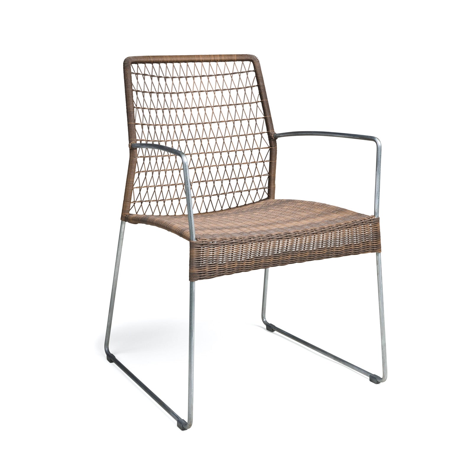 A wicker chair with metal legs and armrests sits empty on a white background, showcasing a woven backrest with a diamond pattern.