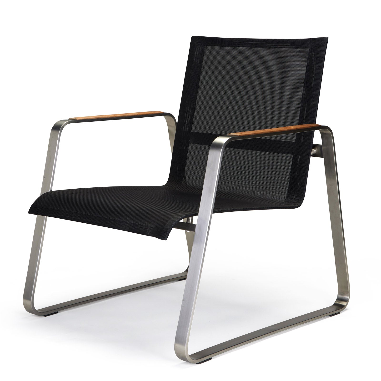 A modern chair with a black mesh seat and backrest sits on sleek metal legs. Wooden armrests add contrast in a minimalist setting.