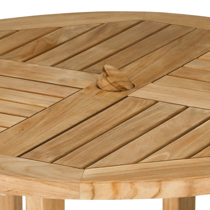 A wooden round table features interlocking slats with a central knob, set in a natural finish. The design accentuates a geometric pattern, creating a rustic, outdoor ambiance.