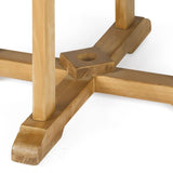 Close-up of teak wood base of round outdoor bar table