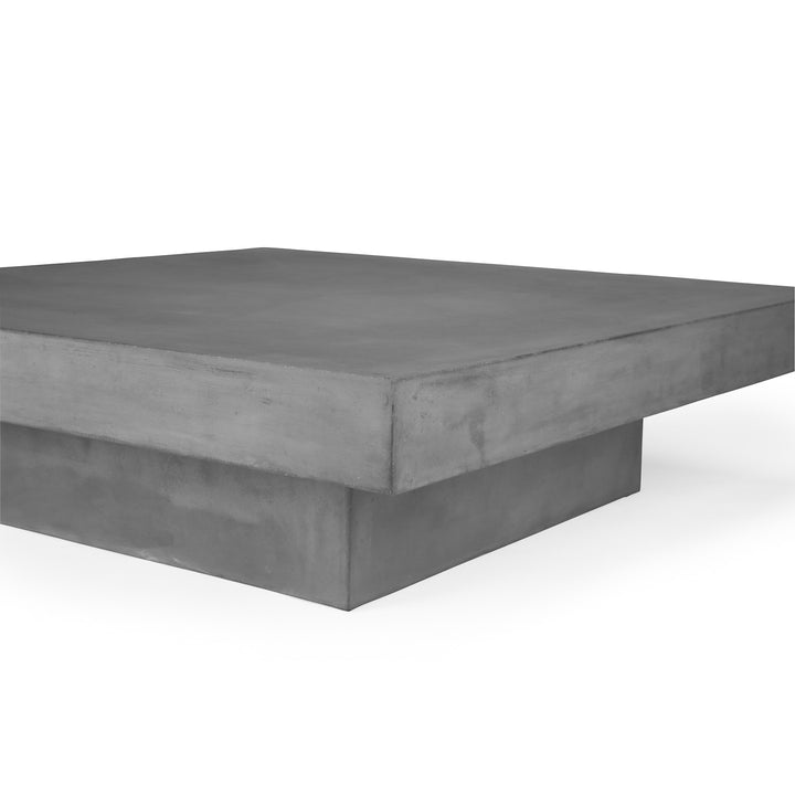 Large, square, gray concrete coffee table appears stationary, with a solid base, set against a plain white background.