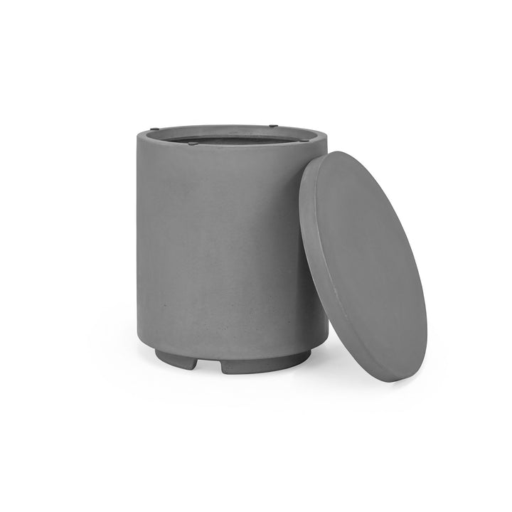 A cylindrical, matte gray container with a matching round lid resting beside it, set against a plain white background. The container has four small feet for stability.