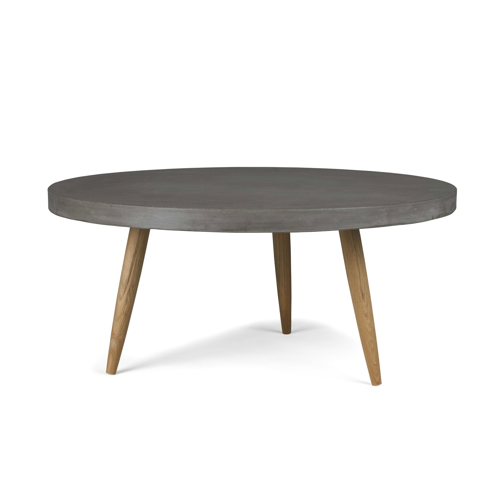 A round, gray concrete table with three angled wooden legs stands in a white, unobstructed space.