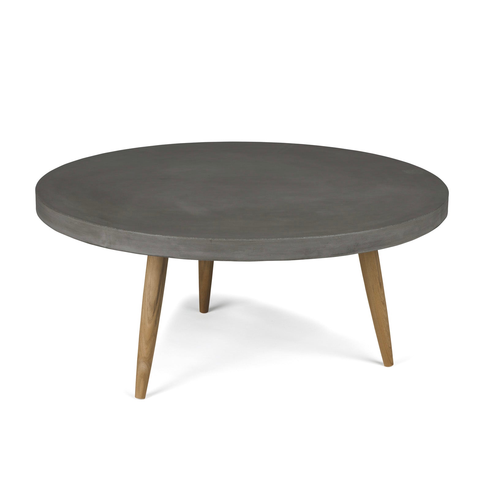 A round concrete tabletop rests on three tapered wooden legs, positioned in a minimalist setting against a plain white background.