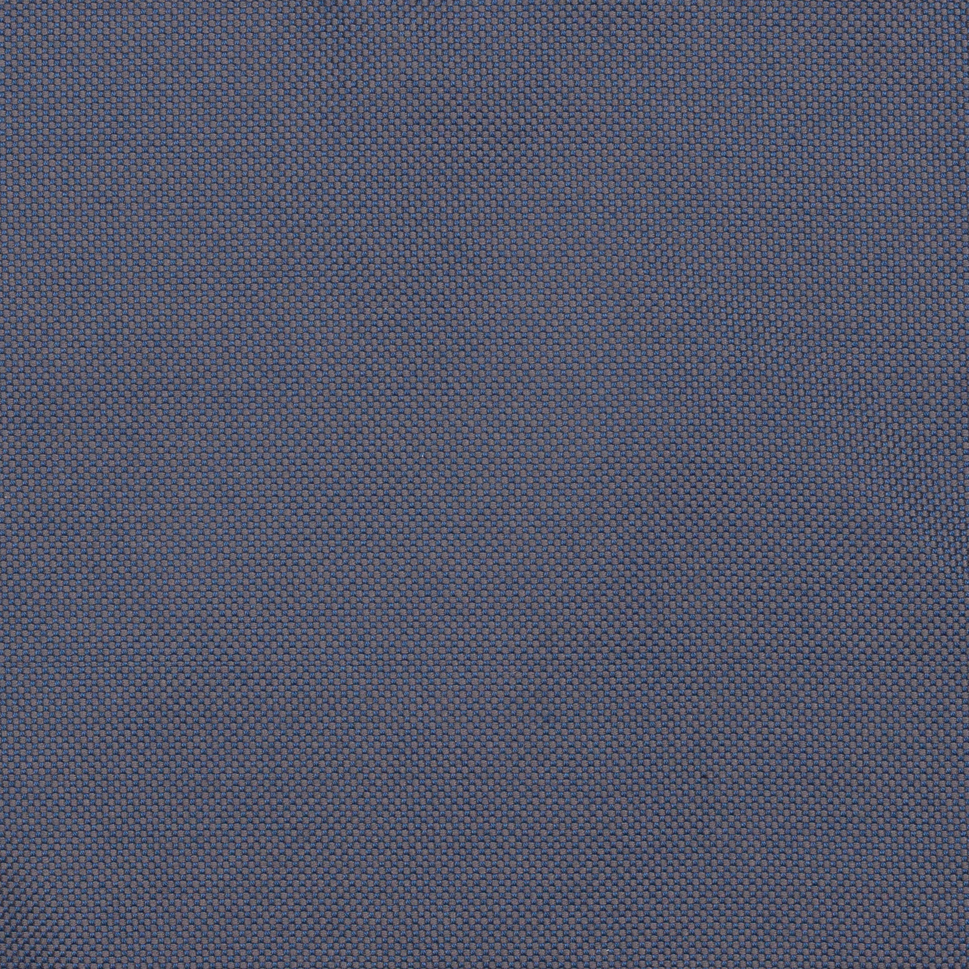 A fabric surface displays a repetitive hexagonal pattern, creating a textured appearance. This dark blue material conveys a sense of durability and uniformity, suitable for various textile applications.