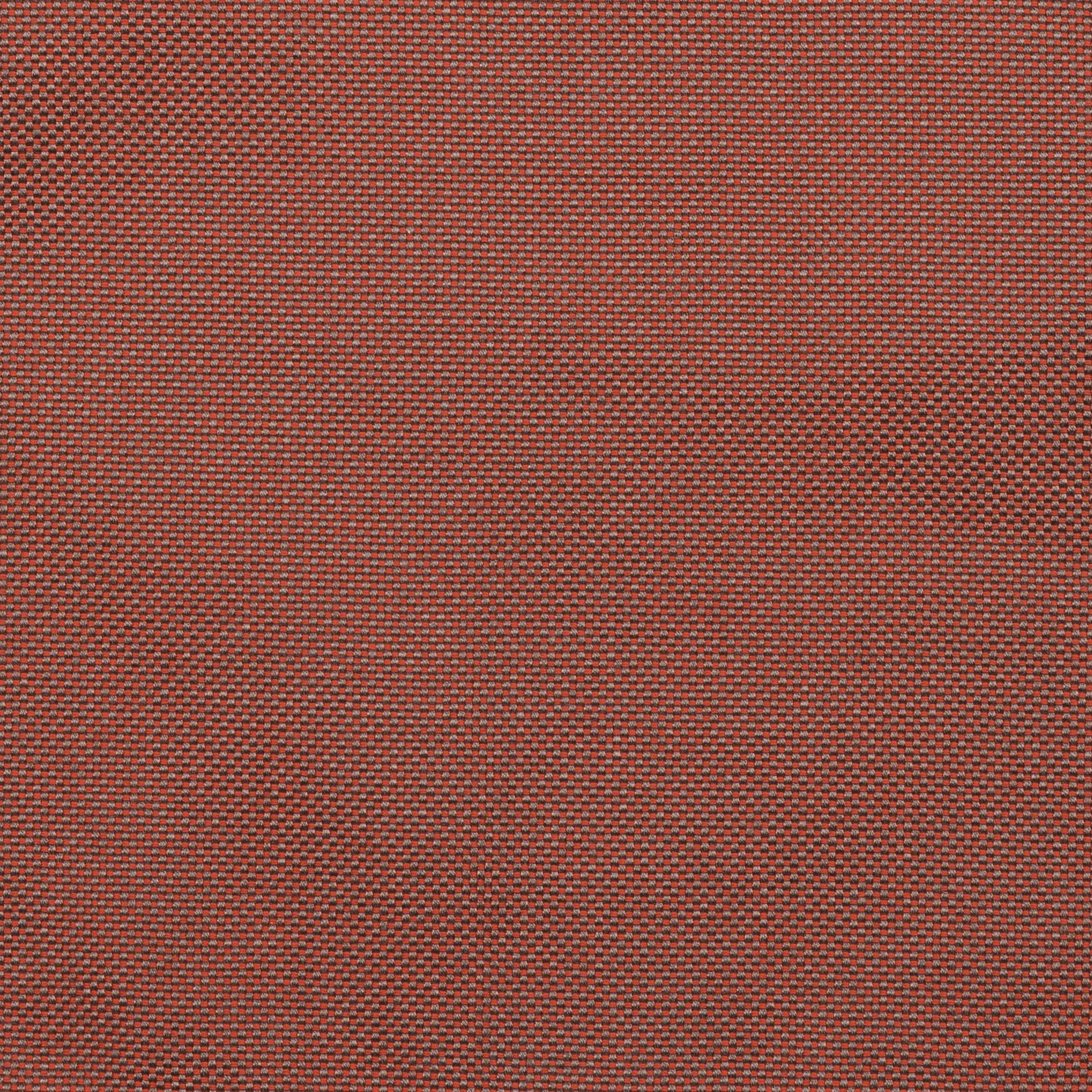 A close-up view of a textured red fabric, displaying a uniform pattern of small, tightly woven threads, creating a checkered appearance across the surface.