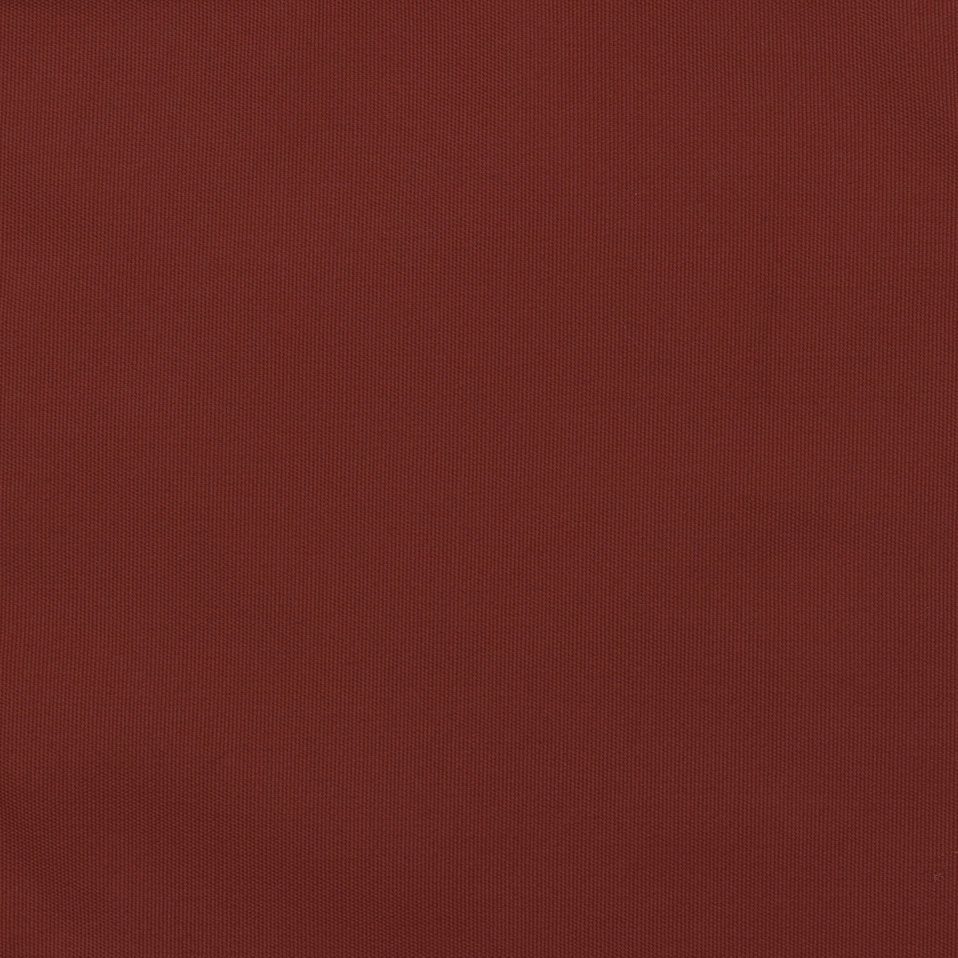 A textured, solid-colored surface, deep reddish-brown in tone, fills the entire frame with no visible patterns or objects, conveying a uniform and consistent appearance.