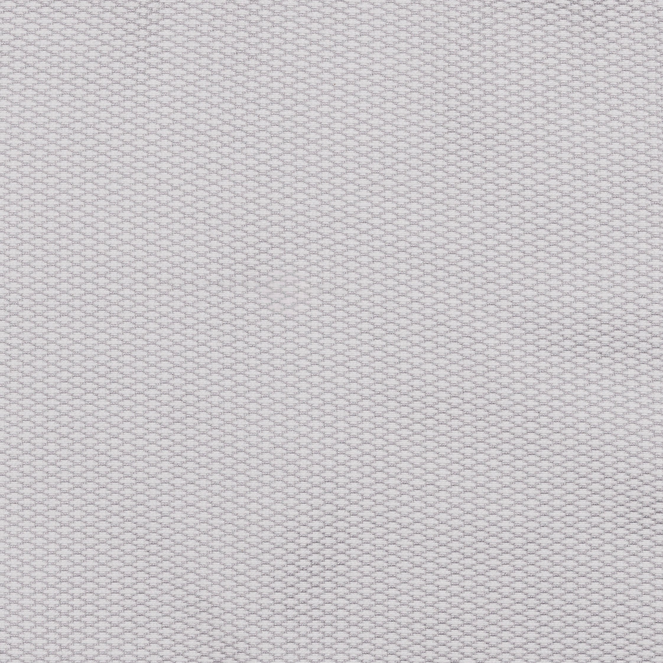 A white mesh fabric displays a repeating hexagonal pattern, covering the entire surface uniformly, suggesting a textured, woven material. There is no text present.