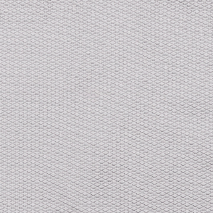 A white mesh fabric displays a repeating hexagonal pattern, covering the entire surface uniformly, suggesting a textured, woven material. There is no text present.