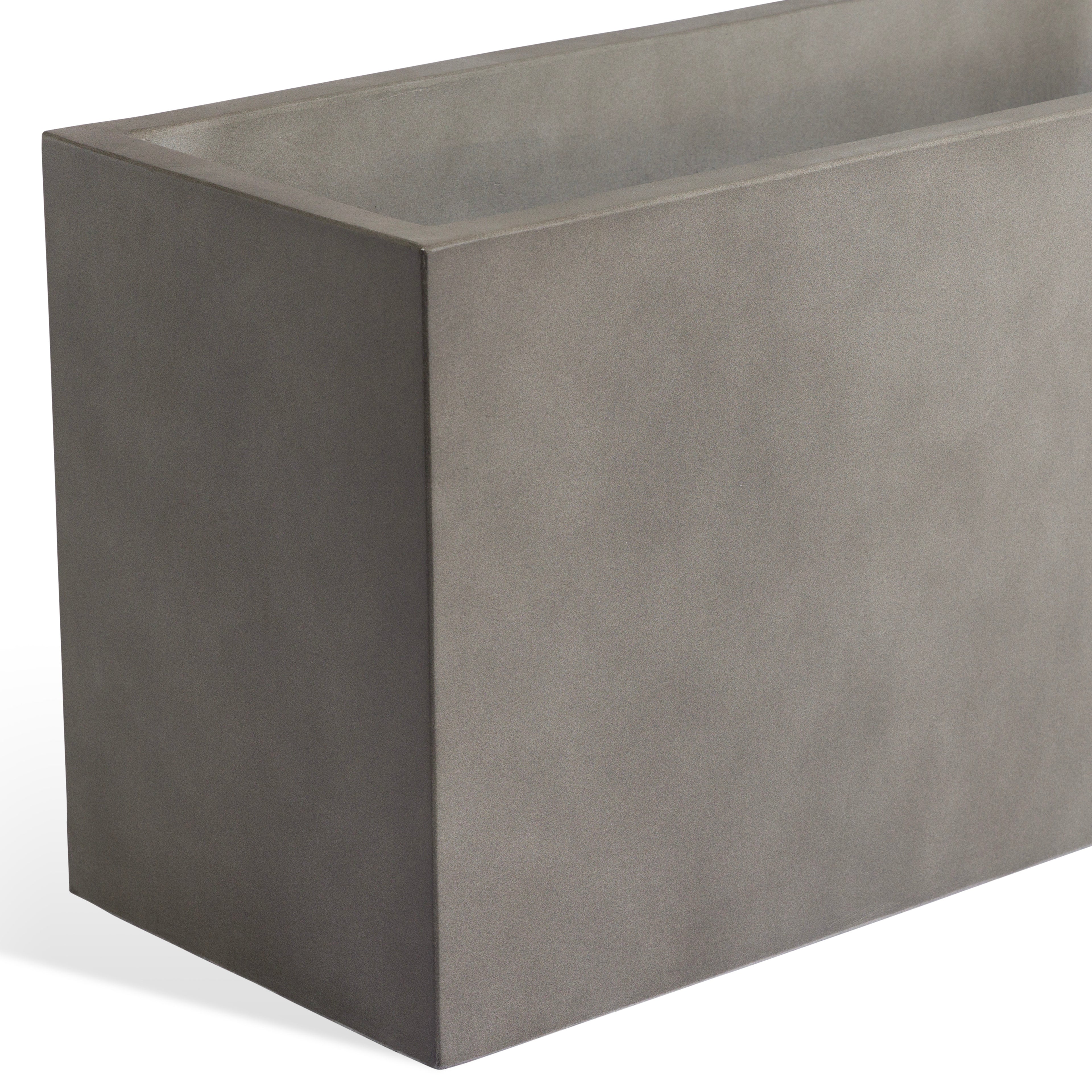 A rectangular, concrete planter stands with a minimalistic design, featuring smooth surfaces and sharp edges. It is situated against a plain background, emphasizing its modern aesthetic.