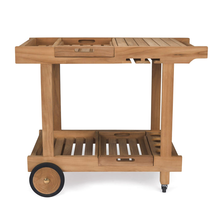 A wooden bar cart, stationary, features slatted shelves and two different-sized wheels within an indoor setting without additional context.