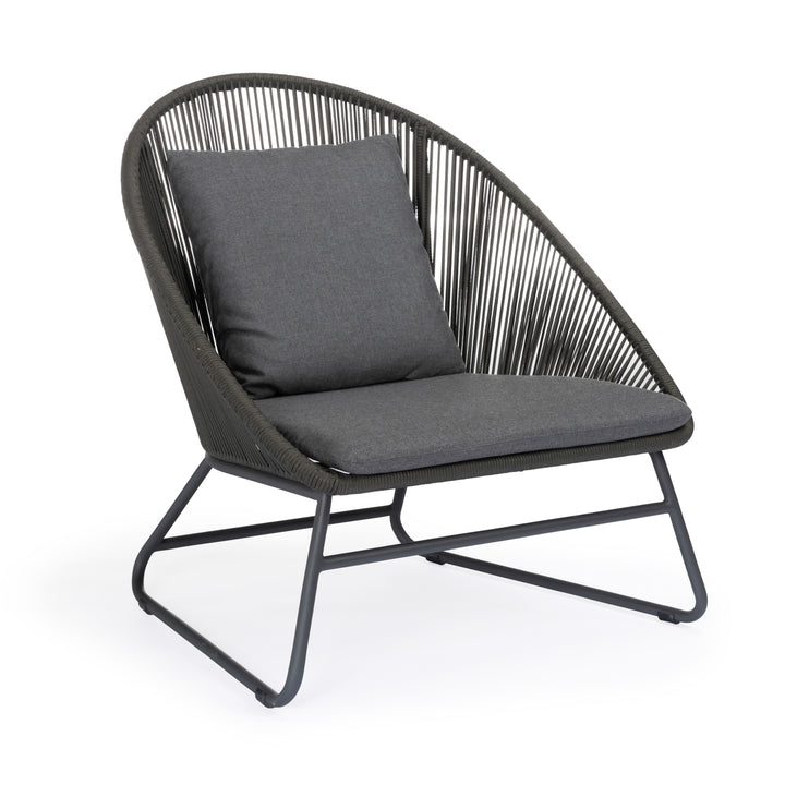 A dark grey lounge chair with woven rope backrest and cushion is set on a metal frame. It is positioned against a plain white background.