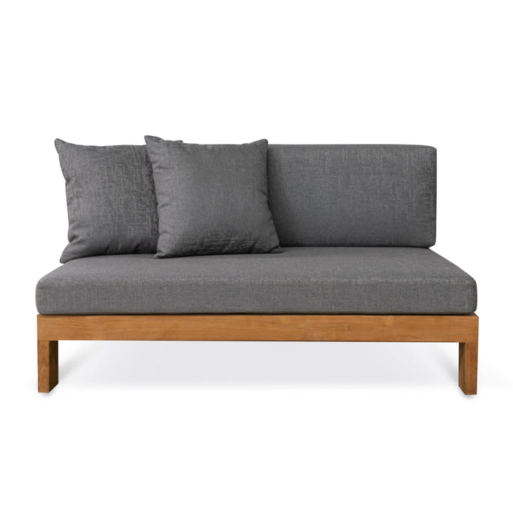 A gray cushioned sofa with two pillows rests on a wooden frame, set against a plain white background.