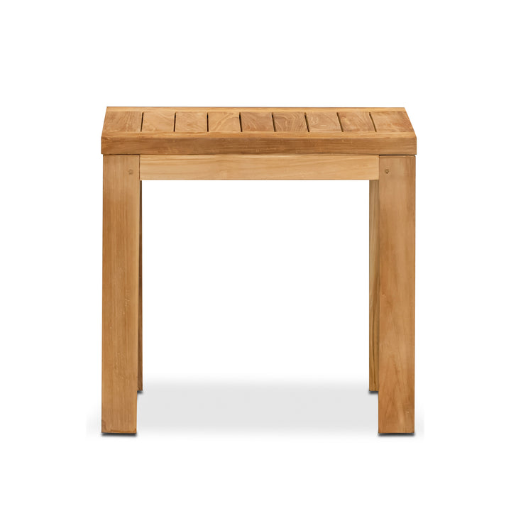 A wooden table stands on a white background, featuring a simple rectangular design with slatted top detailing and sturdy legs.