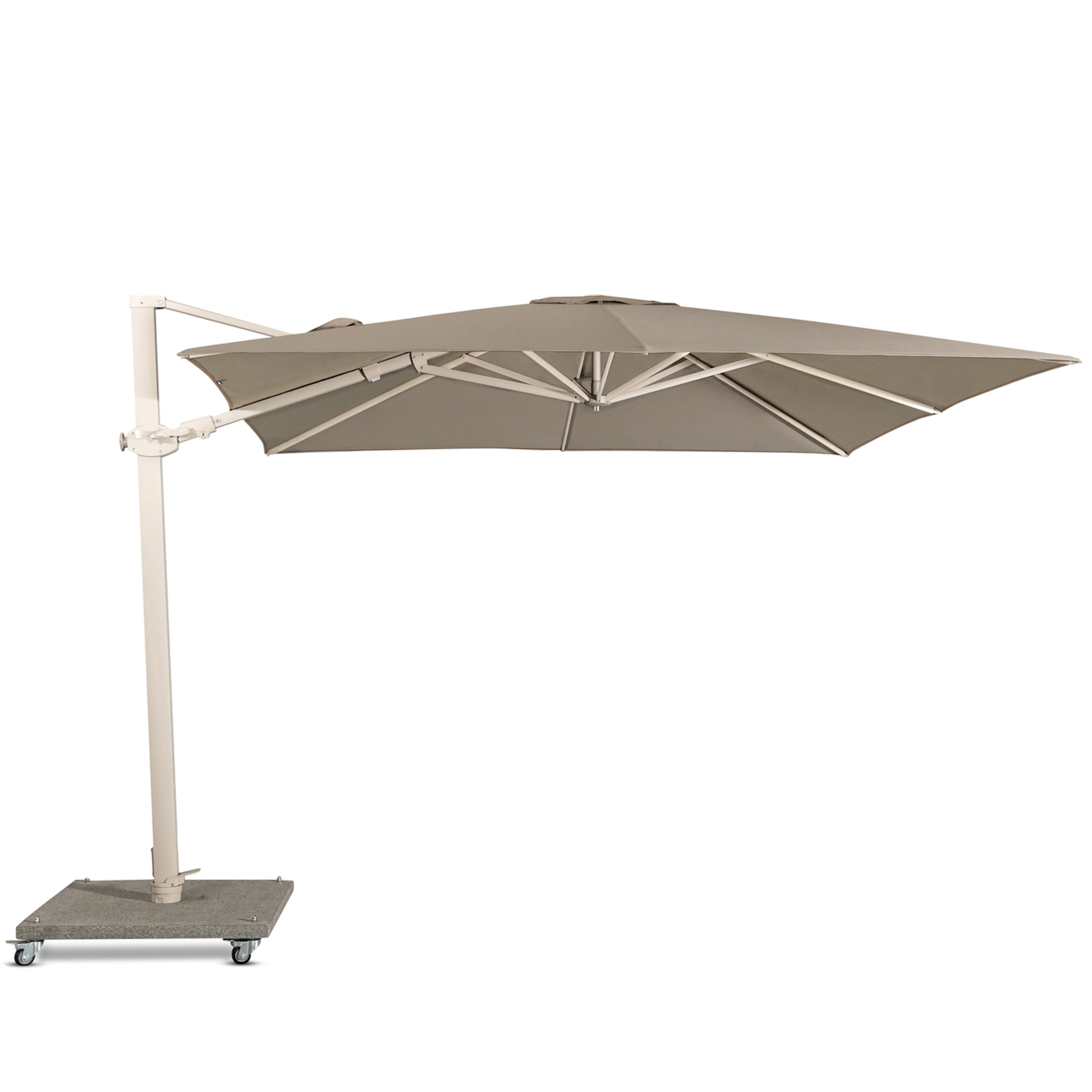 A large beige patio umbrella on a movable stand with wheels stands unfolded, supported by a side pole, suitable for outdoor use.