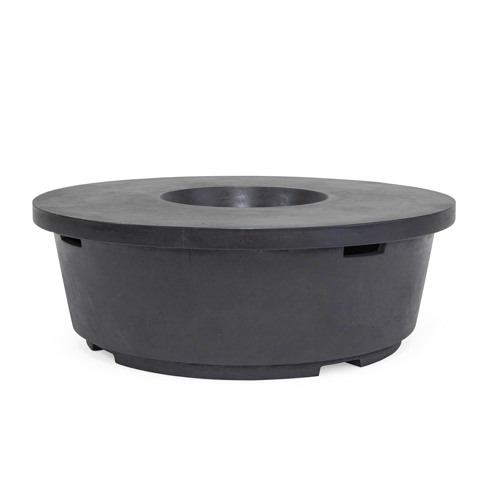 A round, black concrete fire pit table with a recessed center is shown, standing against a plain white background.