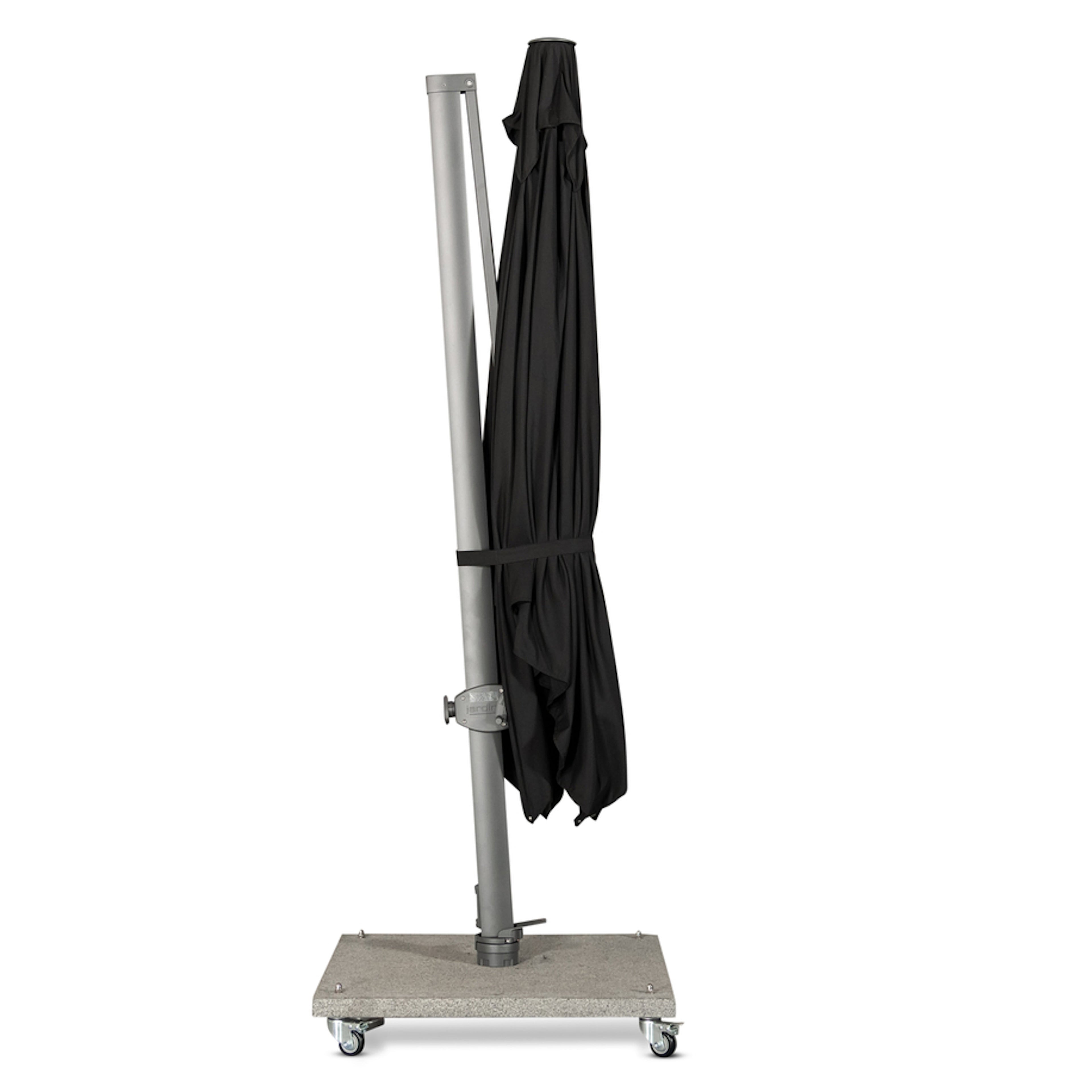 A closed black umbrella is secured to a vertical gray pole, which is mounted on a wheeled, rectangular base in a minimal indoor setting.