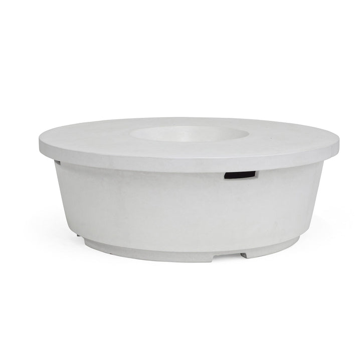 A large, round, white fire pit with a central recessed area sits on a plain white background. The design is minimalist, with a smooth surface and clean edges.