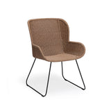 Georgia Wicker Outdoor Dining Arm Chair in Honey showcasing its elegant design and supportive armrests, perfect for luxurious outdoor dining.