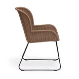 Stylish Georgia Wicker Outdoor Dining Arm Chair in Honey, featuring durable outdoor-grade wicker and a refined sculpted form for comfort.