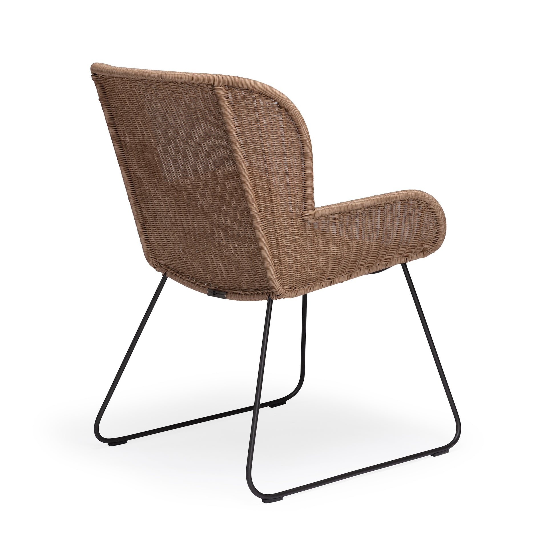 Close-up of the Georgia Wicker Outdoor Dining Arm Chair in Honey, highlighting the warm hue and sturdy steel base for lasting stability.