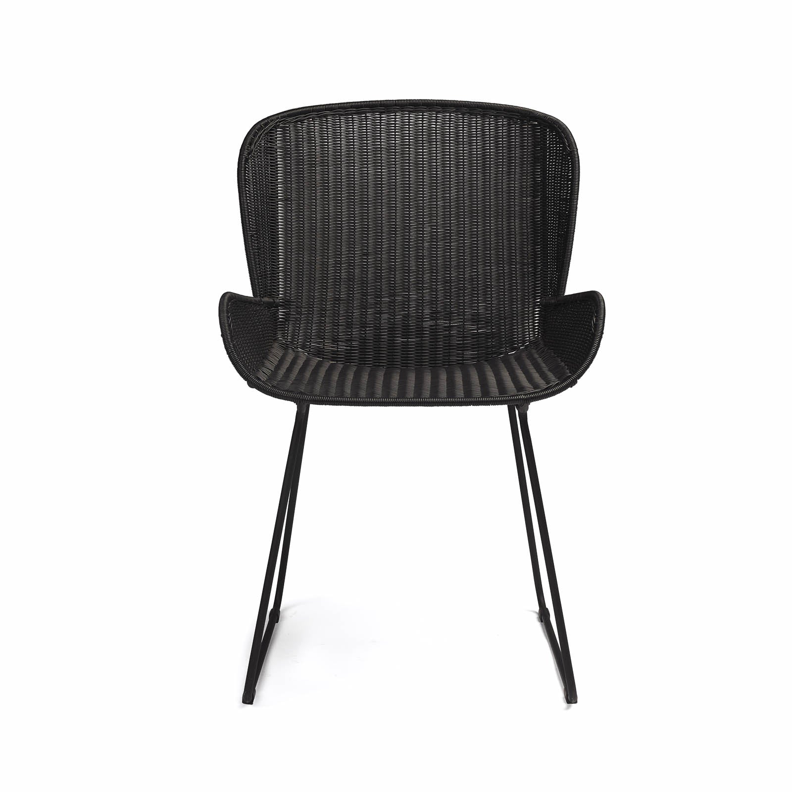 A black, woven wicker chair stands on thin metal legs against a plain white background, showcasing a contemporary and minimalist design.