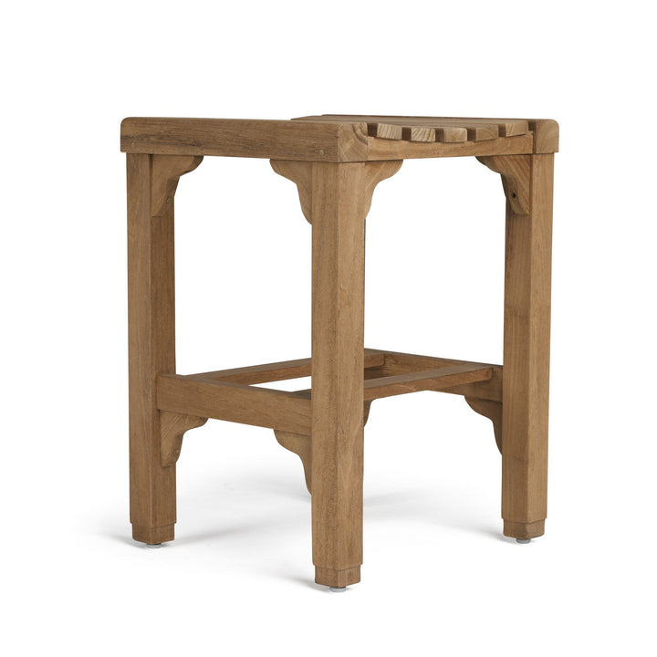 A wooden stool stands with a square slatted seat and four straight legs, set against a plain white background.