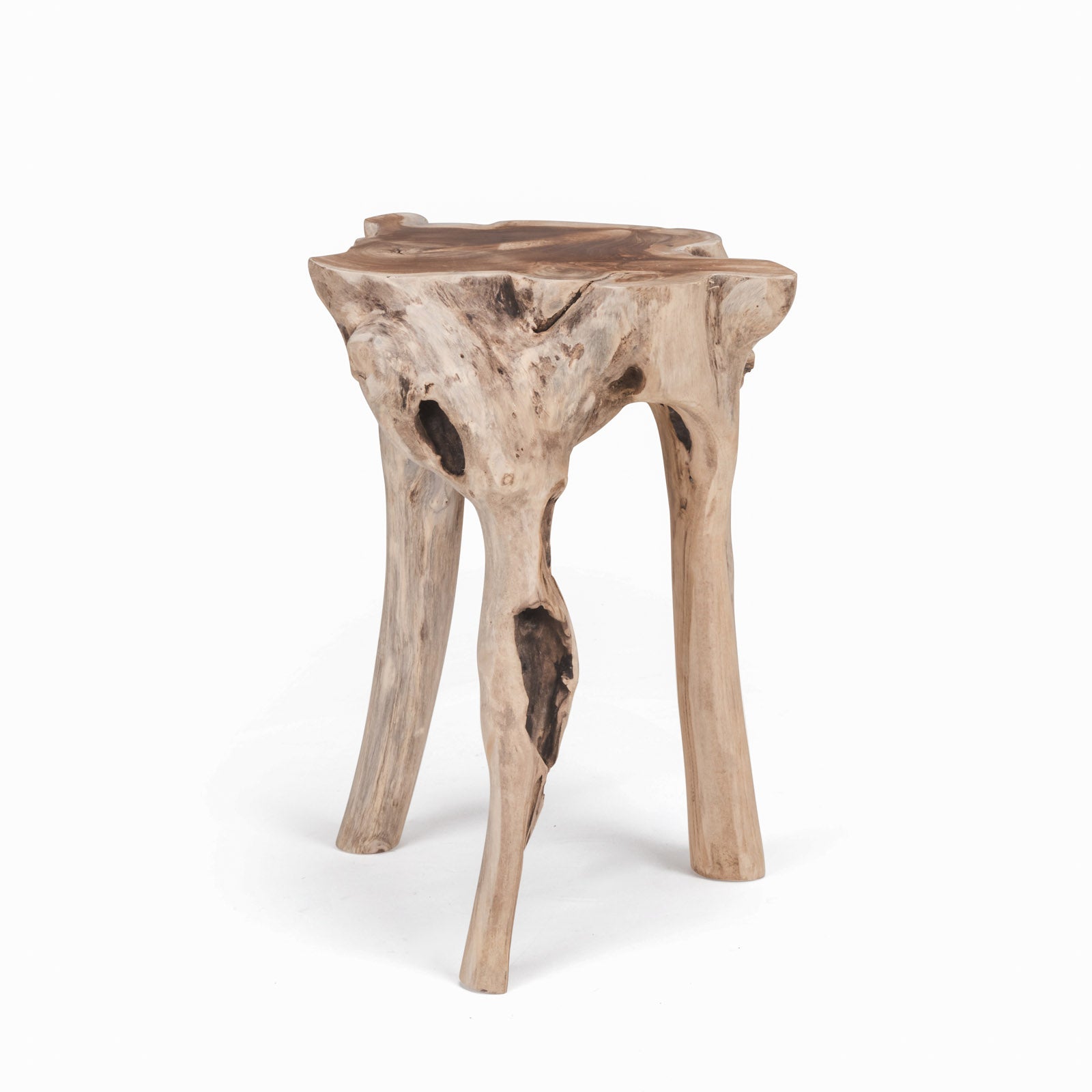 Wooden stool with a natural, rustic finish, featuring an irregular, organic shape and texture. Stands on three uneven legs, resembling a tree root, against a white background.