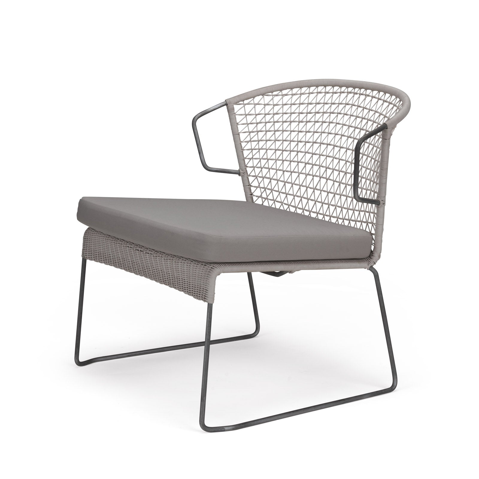 A modern lounge chair features a gray cushion on a woven, mesh backrest and seat, supported by slim metal legs, set against a white background.