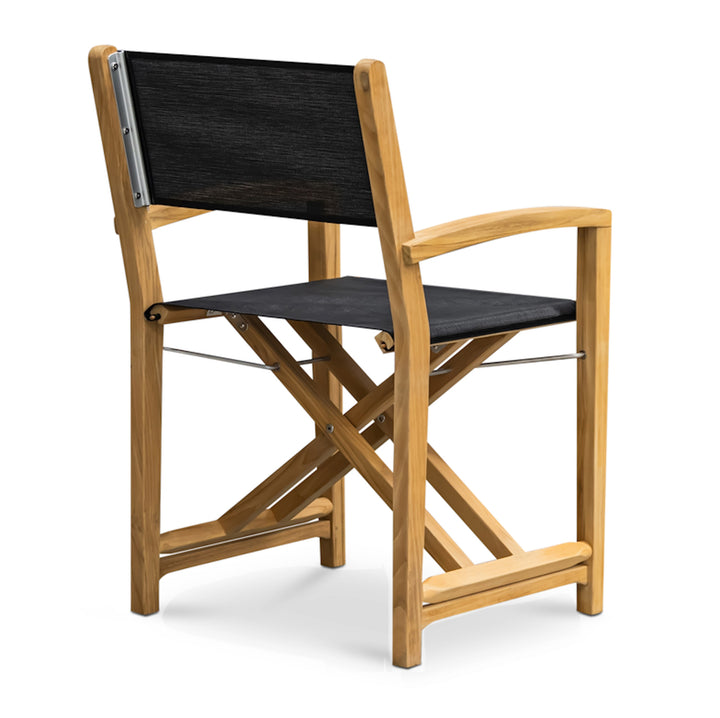 A wooden director's chair stands upright, featuring a foldable design with black fabric seat and backrest, situated against a plain white background.