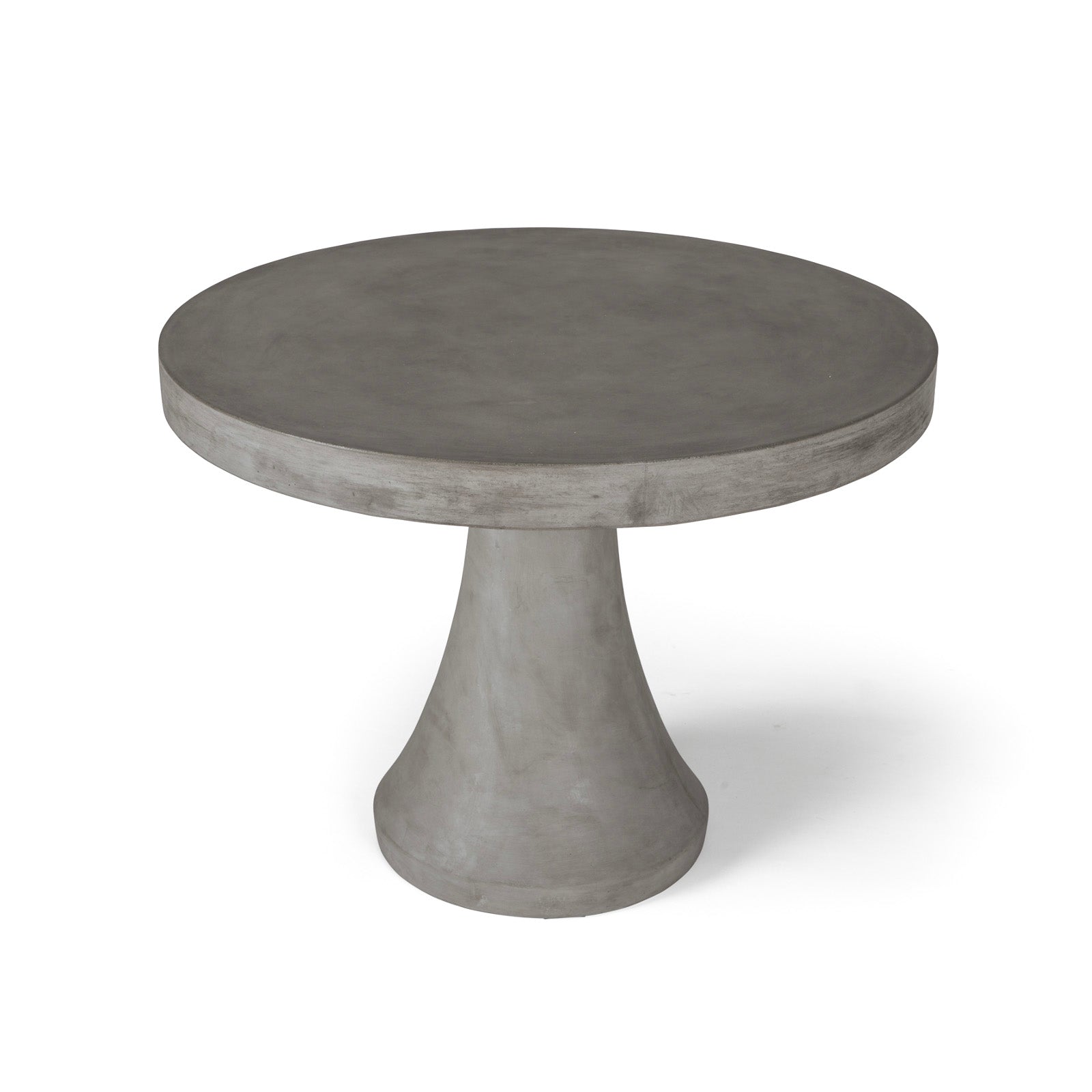 A round, grey concrete table rests on a conical pedestal base, set against a plain white background.