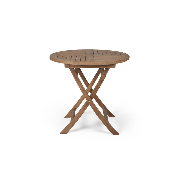 A round wooden table with slatted top, featuring crossed legs for support. The table is placed on a plain white background.