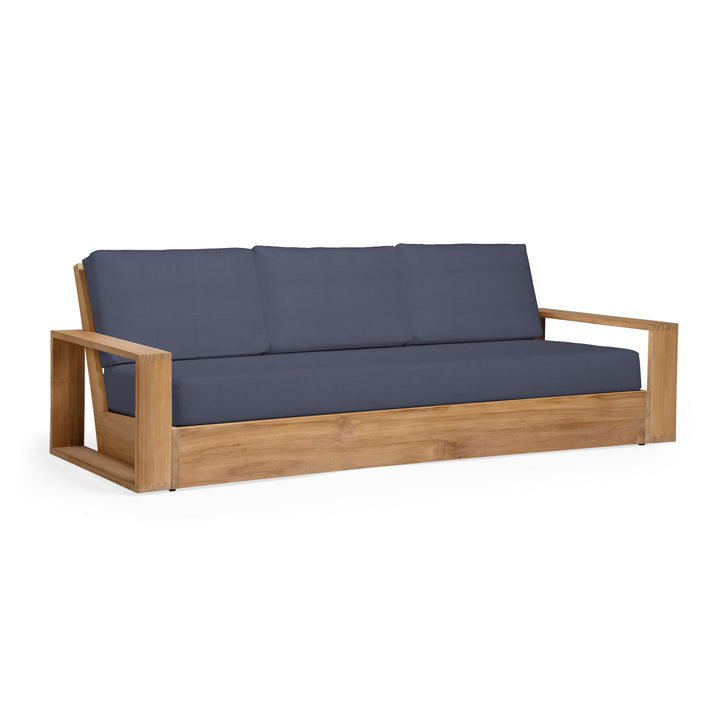 Wooden sofa with navy cushions on a white background