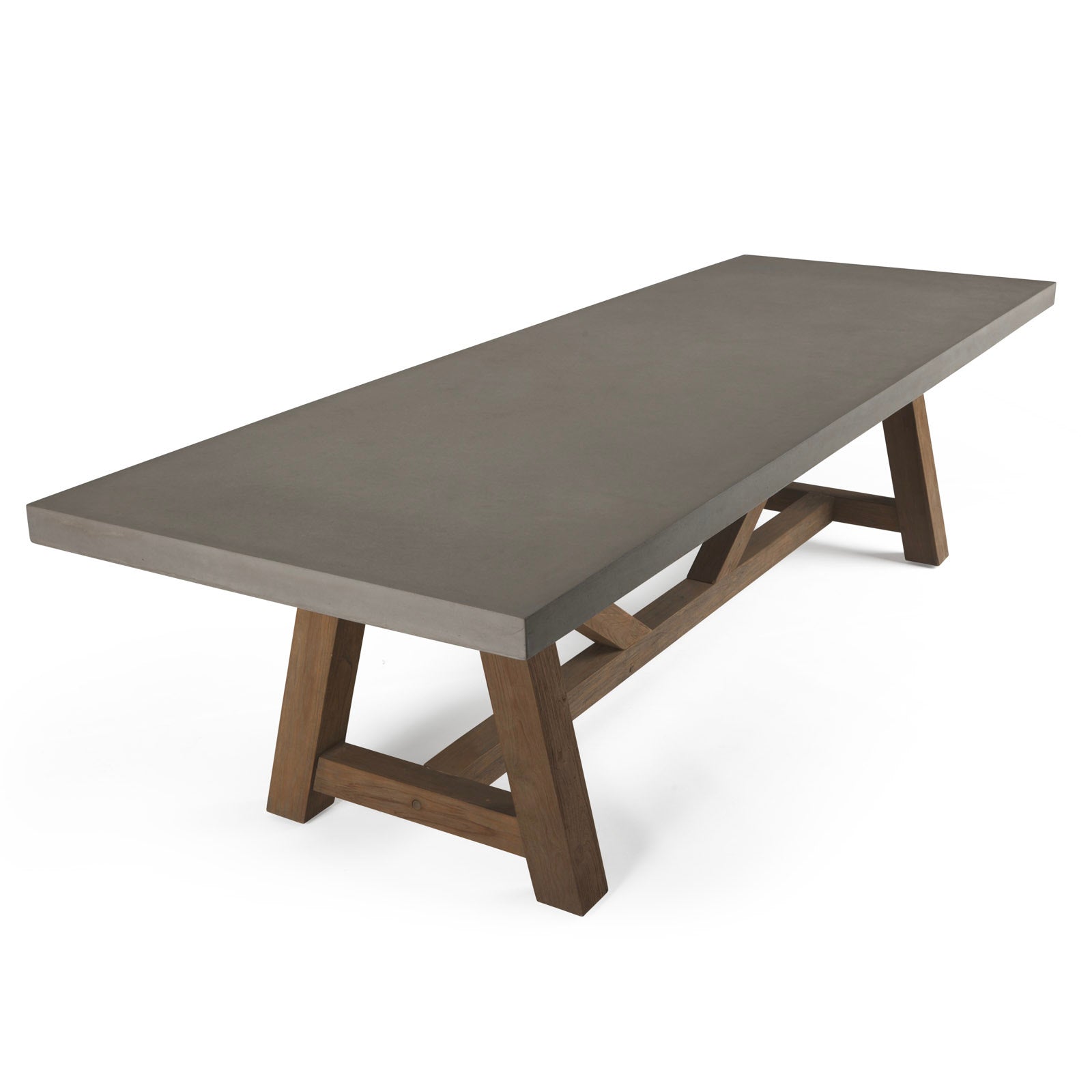 A long rectangular table features a smooth, gray concrete top supported by sturdy wooden trestle legs on a white background.