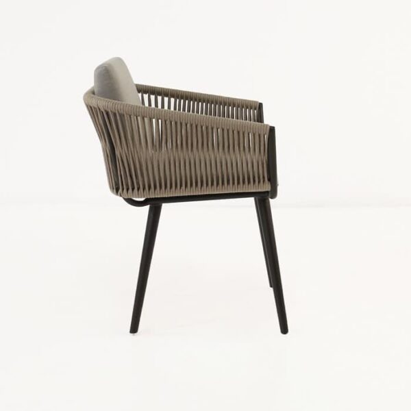 Brown wicker dining chair side view